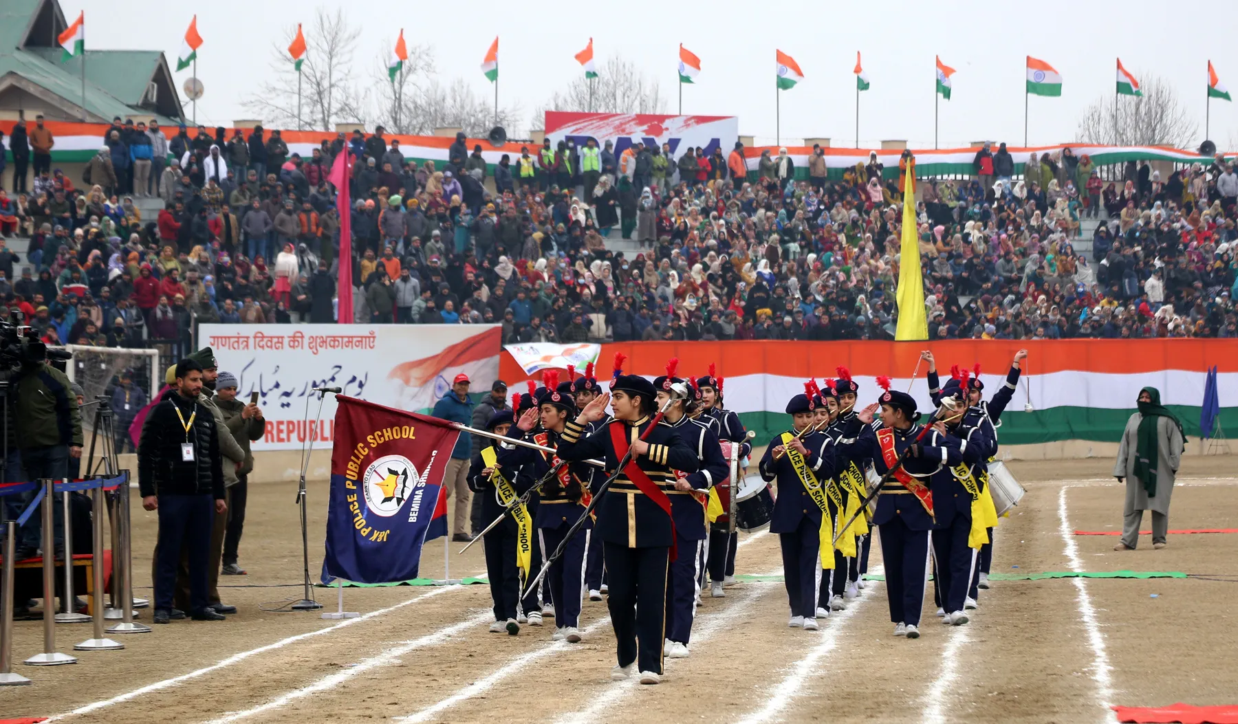The students of J&K Police Public School take part in the march past during the Republic Day function at Bakshi stadium in Srinagar on Friday. Mubashir Khan for Greater Kashmir