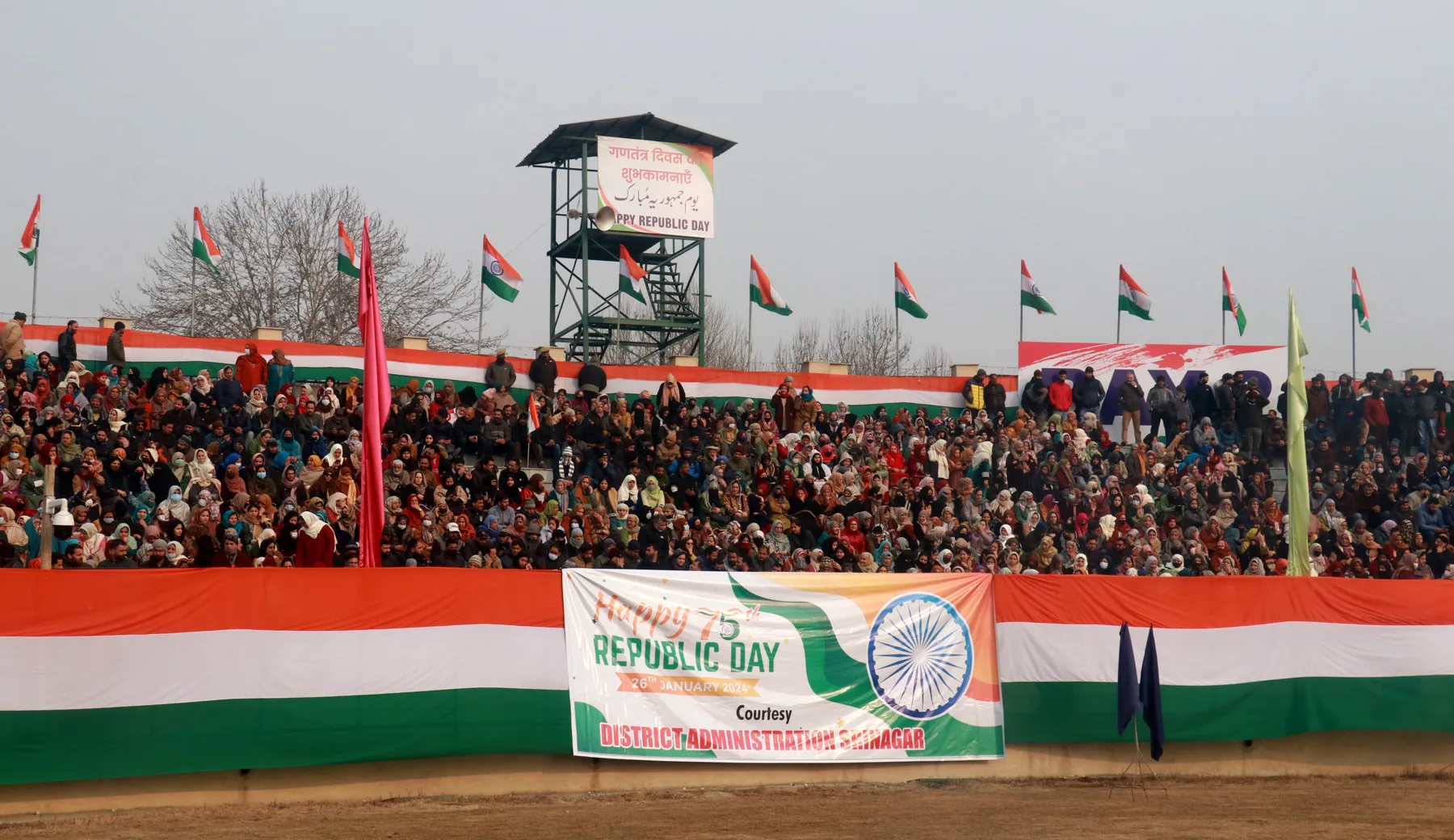 A large crowd watches the Republic Day parade at Bakshi stadium in Srinagar on Friday. Mubashir Khan for Greater Kashmir